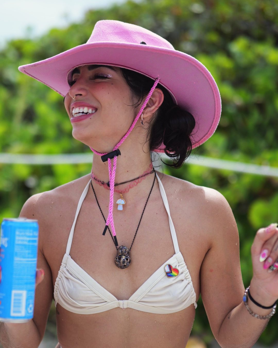 Selene Ashé, founder and host of the Bootyverse, in a pink cowboy hat