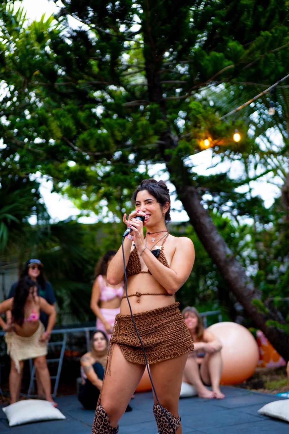 Host on the mic in front of the crowd
